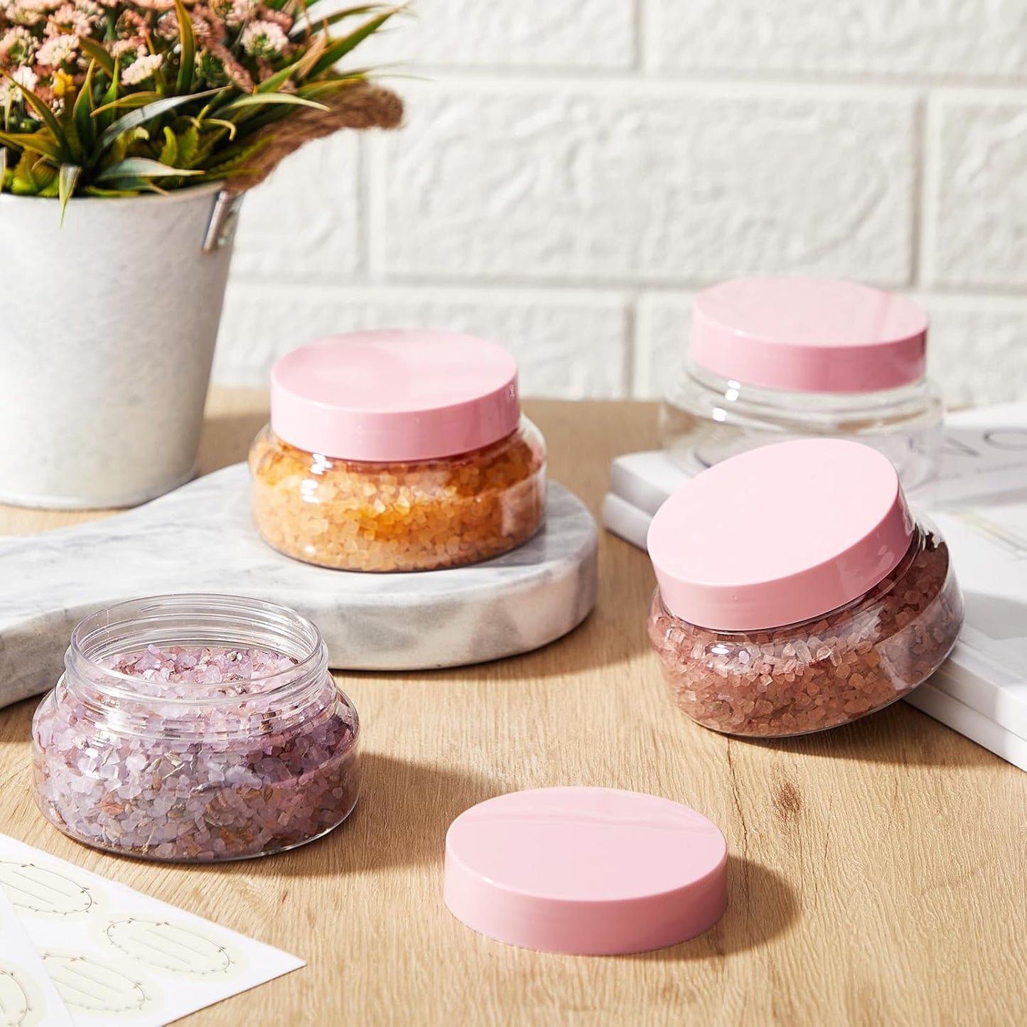 Tessco 24 Pack Plastic Jars with Lids Labels Empty Clear Plastic Jars Round Refillable Cosmetic Containers Body Butter Containers Bulk Sugar Scrub Bottle for Make Up(5 oz,Clear, Pink)